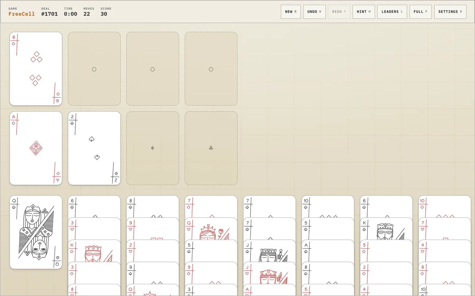 A game of FreeCell in progress with four free cells and four foundations across the top