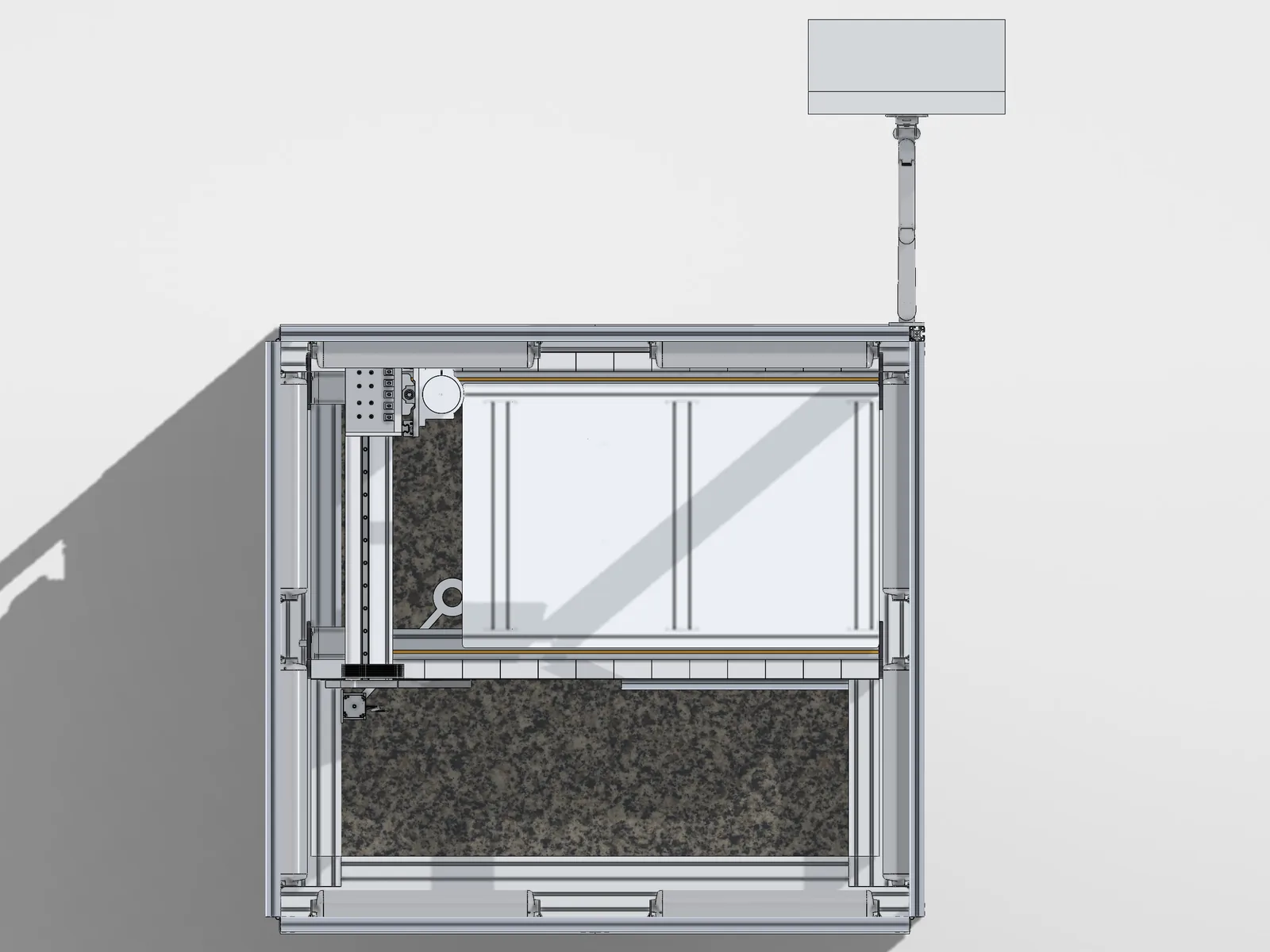 A top view CAD render of the CNC machine, with the gantry across the short side of a white vacuum plate and bare granite beside it