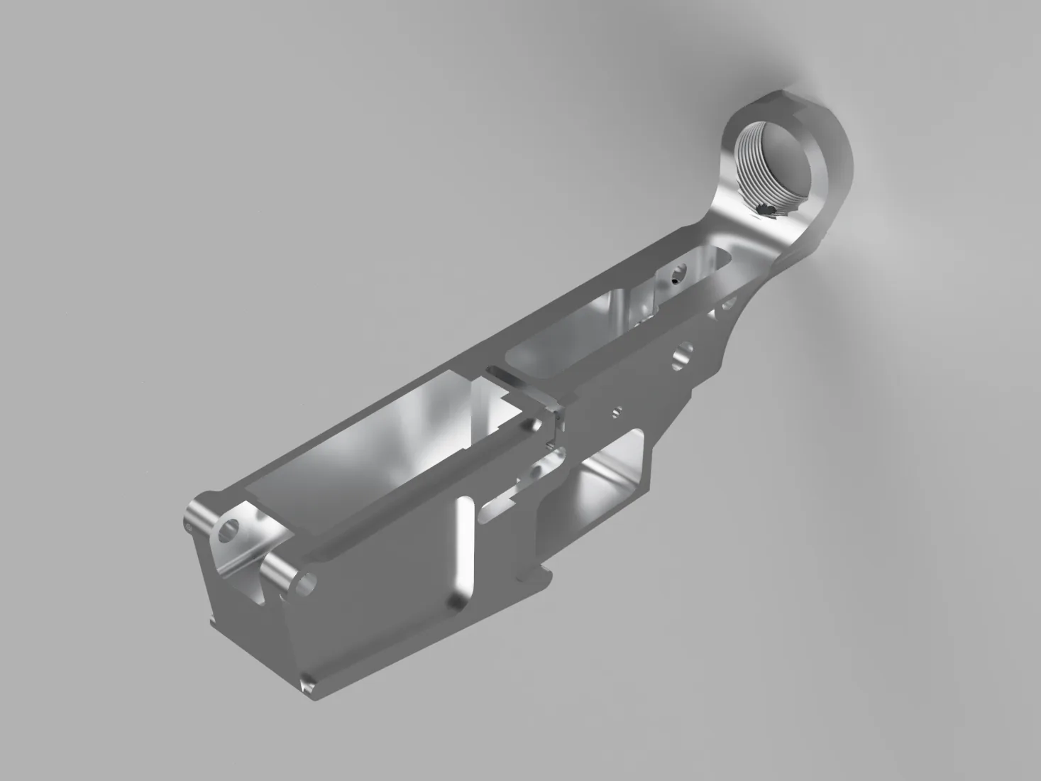 A render of a bare aluminium AR-10 lower receiver seen from above at an angle: the open magazine well at the front, the trigger pocket in the middle and a round threaded ring at the back